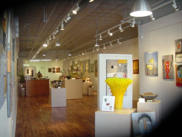 Poppy Art Gallery Relocation and Renovation (5,500 sq. ft.) "The most challenging part of this project was integrating the display and lighting systems into a flexible retail space." - Sherry